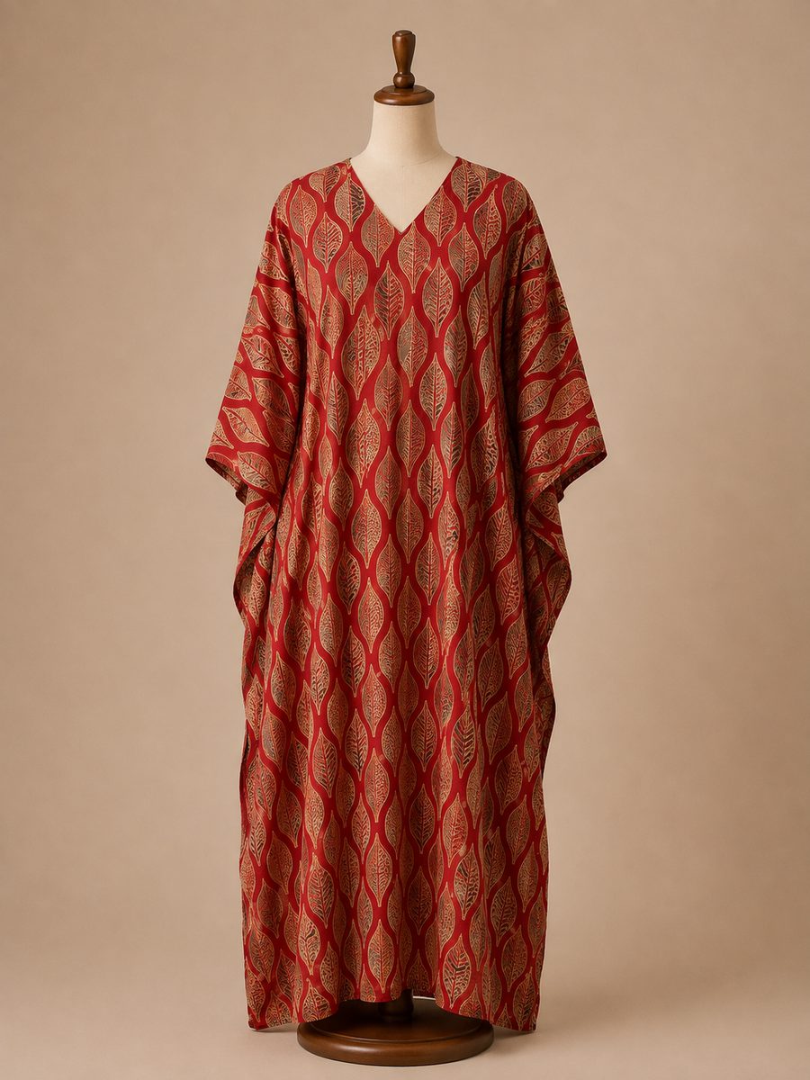 Rust-red modal silk kaftan with an all-over print
